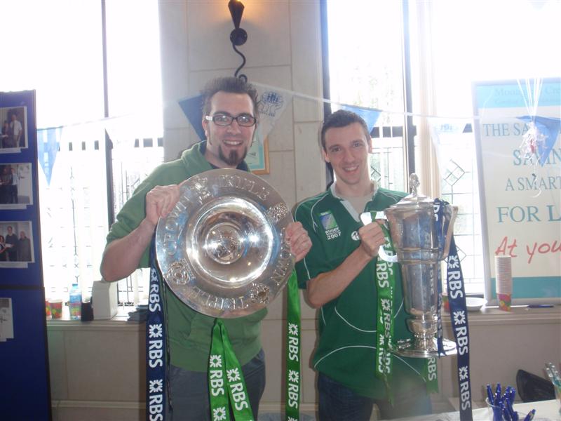 Adam and Me with the Six Nations and Triple Crown trophies